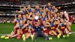 The Brisbane Lions celebrating the 2025