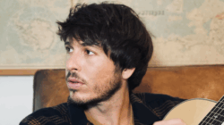 Morgan evans looking off camera with