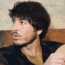 Morgan evans looking off camera with