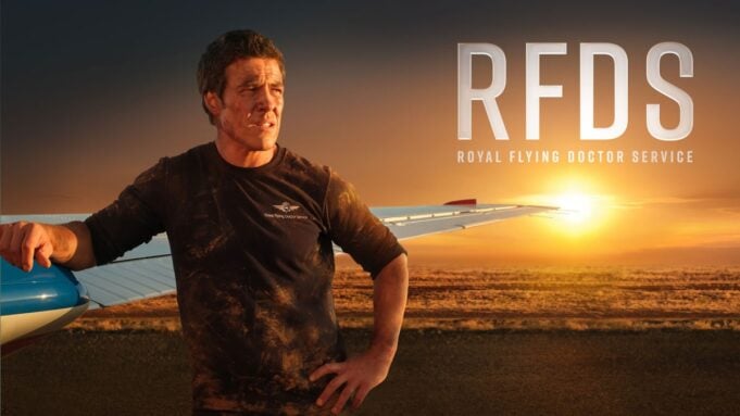 Stephen Peacocke posing with "RFDS" in