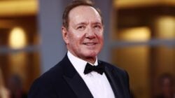 Kevin Spacey poses at event