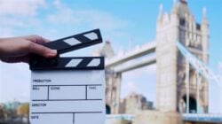 A clapperboard in front of Tower