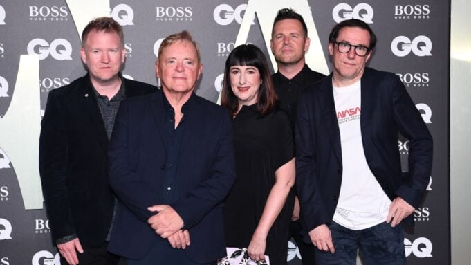 Two Members of New Order Step