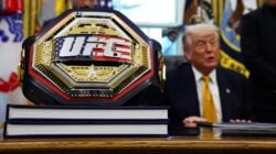 UFC belt in front of Donald